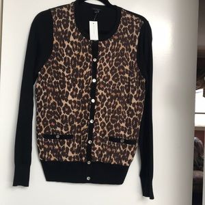 Leopard print and black cardigan.